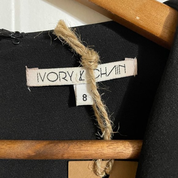 Ivory & Chain Black Caped Jumpsuit NWT - Picture 4 of 10